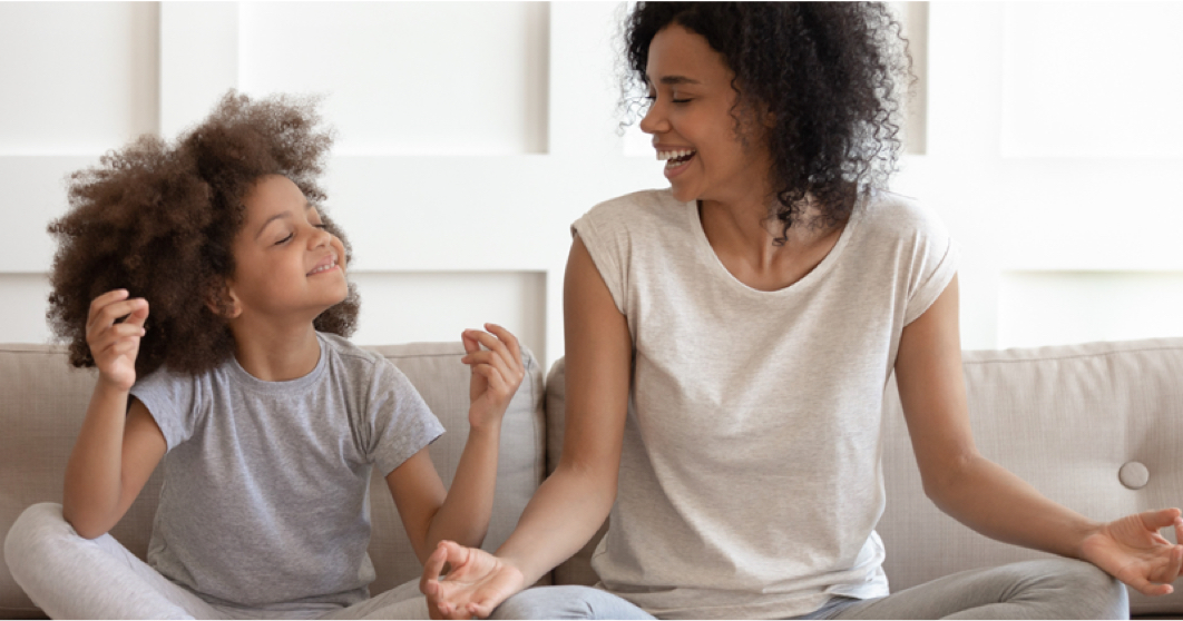 A mother smiling at her daughter